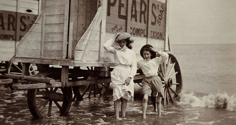 Girls Paddling Beside Bathing Machines, C 1900.