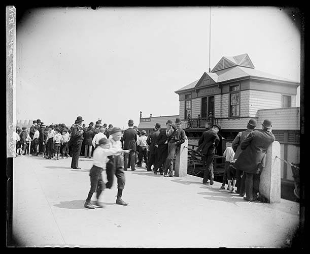 People Gathered Outside The Free Public Baths At The Battery, New York City, 1890.