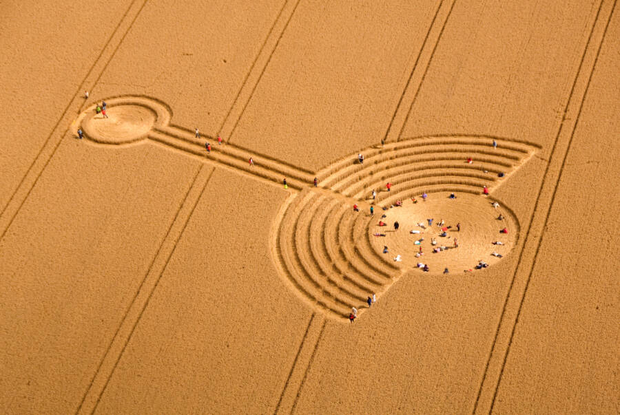 People Standing In Alton Barnes Crop Circle