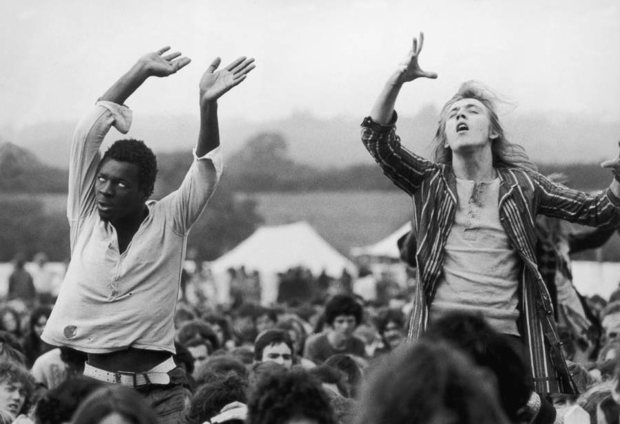 Hippies Dancing At Festival