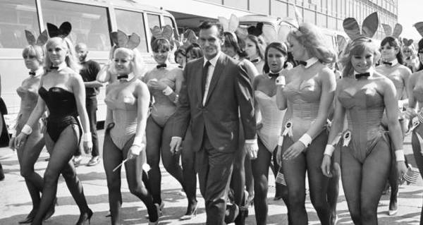 Hefner Walking With Women