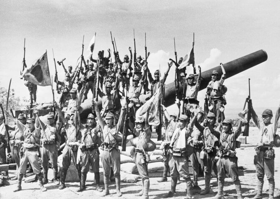Japanese Soldiers On Captured American Gun