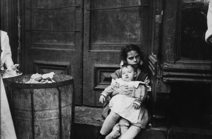 Jacob Riis Photographs Girl Holding Baby