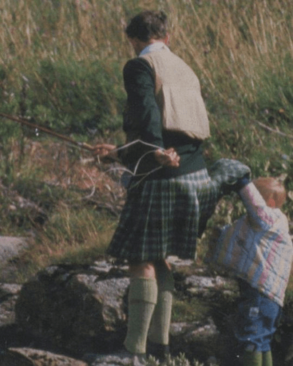 Prince Harry Looks Up Charles' Kilt