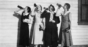 Four Flappers Drinking