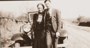 Bonnie And Clyde Standing By Car