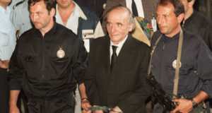 Klaus Barbie In Handcuffs Colorized Featured