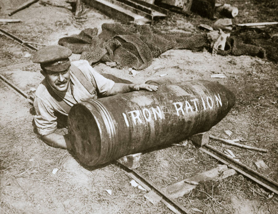 Man Spoons Ammunition Shell