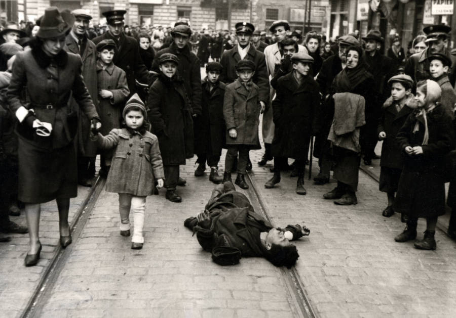 Warsaw Ghetto Passersby Ignoring Man