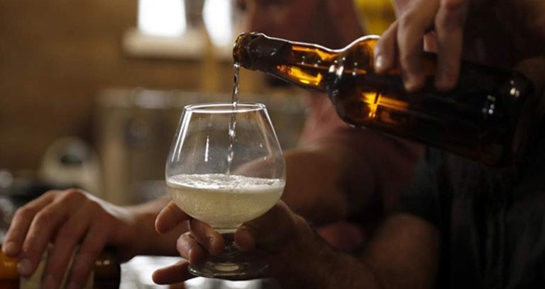 Pouring Ancient Beer Featured