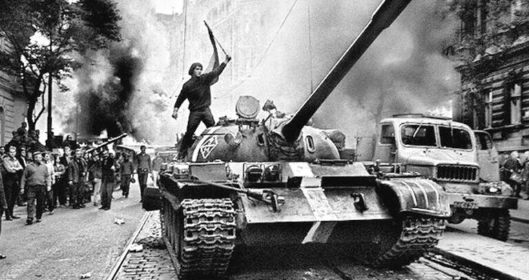 Man Aboard Tank Holding Czech Flag