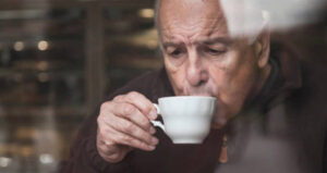 Old Man Sipping Coffee