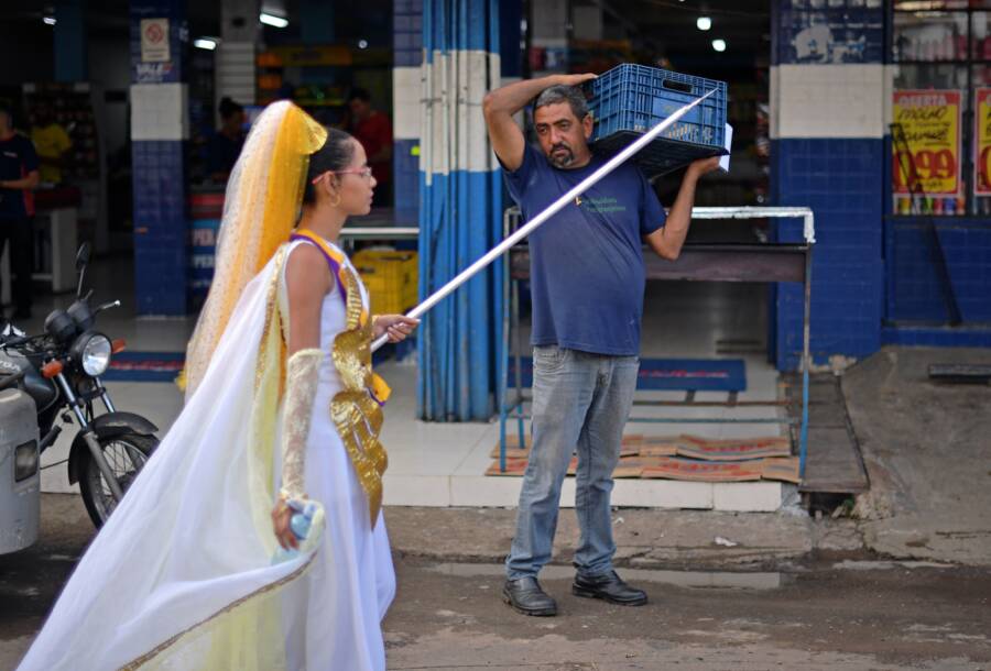 Nymph Walks Past Shop
