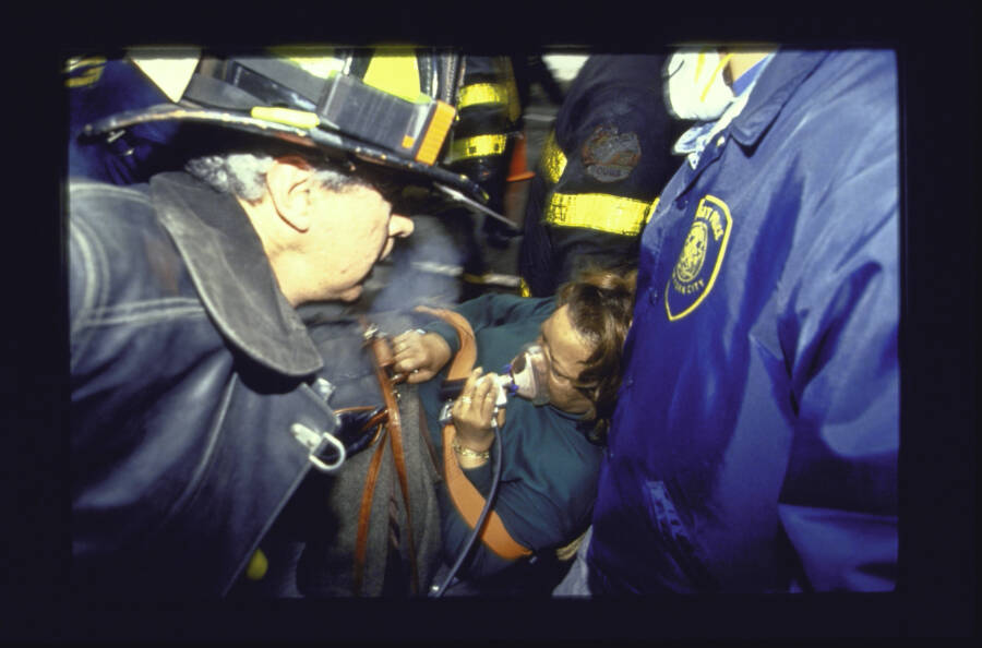 Firefighters Helping A Woman During The 1993 World Trade Center Bombing