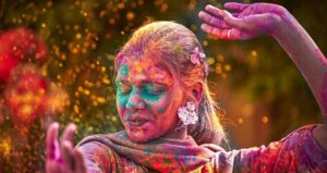 Woman Dancing At Holi Festival