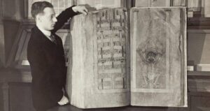 Man Next To Codex Gigas