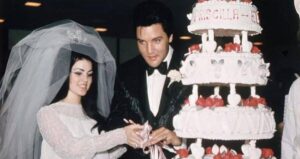 Elvis And Priscilla Cutting Wedding Cake
