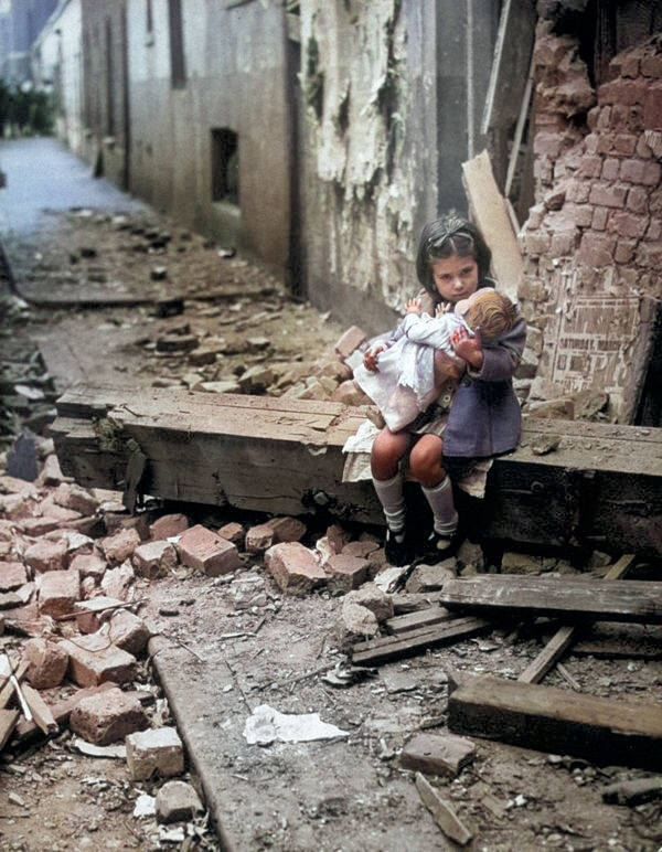 A Girl Holding A Doll