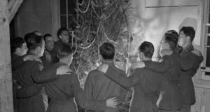 Troops Around A Christmas Tree Featured