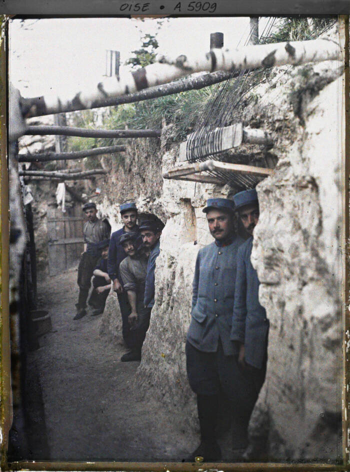 Soldiers Standing In Trench